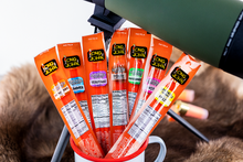 Load image into Gallery viewer, Different flavored smokies in mug.